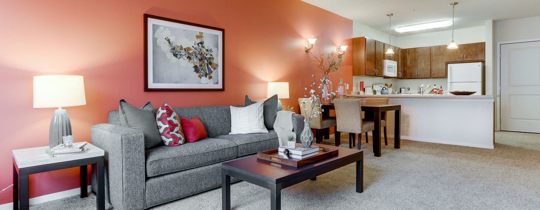 a living room with a couch and coffee table