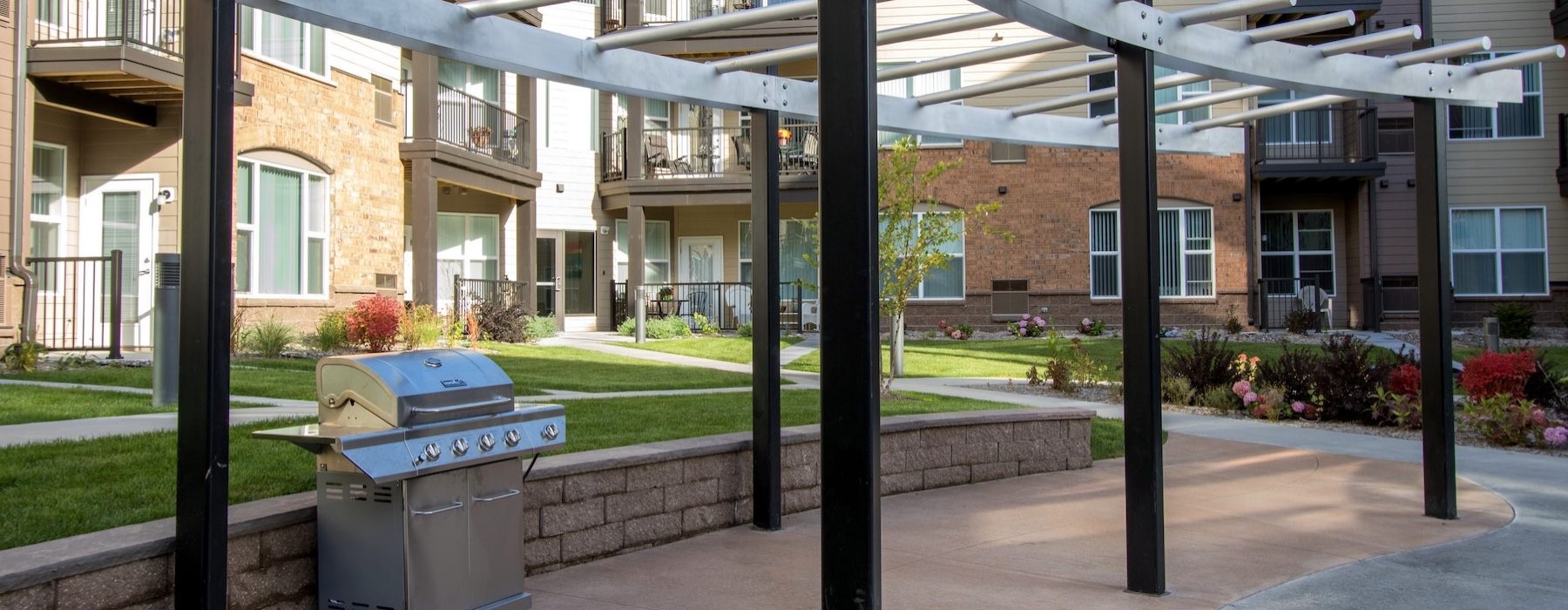 a grill area with a structure