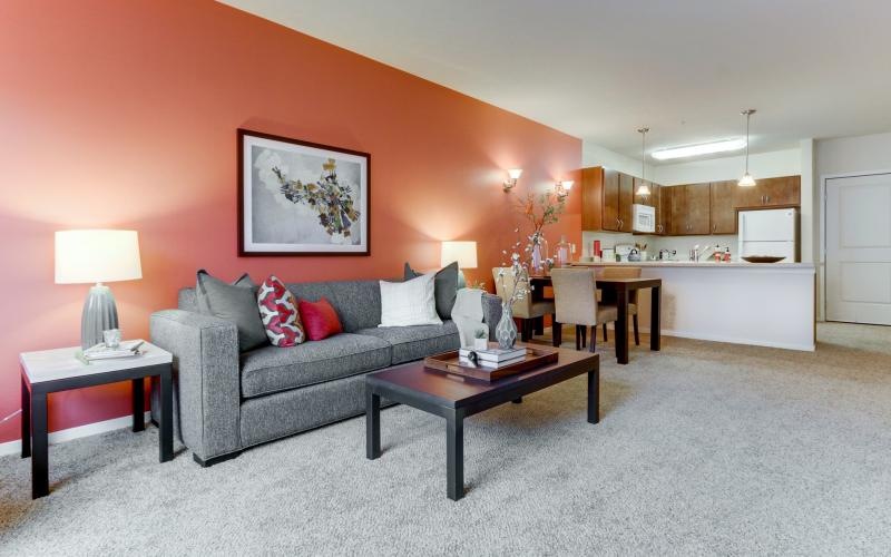 a living room with a couch and coffee table