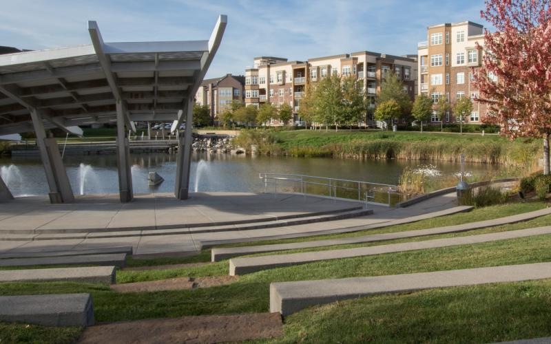 a large water fountain in a park